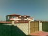 Sea view villa near a golf course parking area